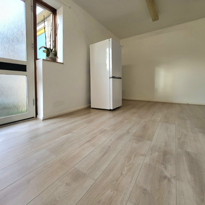 Laminate flooring installation in kitchen.