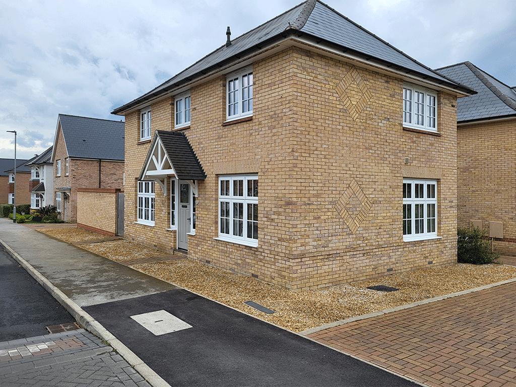 Removal of weeds and turf in Ely and replacing with decorative gravel.
