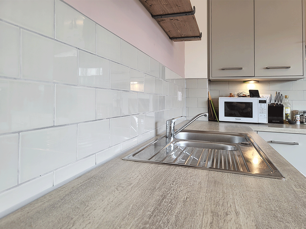 Kitchen splashback & shelf installation in Ely