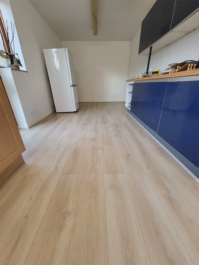 Removal of old carpet & Installation of laminate flooring in Ely